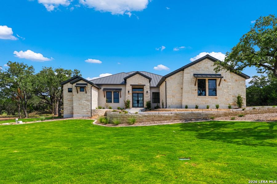 Front exterior of a new home in , Boerne, TX, highlighting curb appeal (Image 1). Front exterior of a new home in , Boerne, TX, highlighting curb appeal (Image 1).