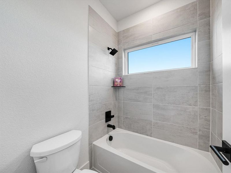 Furnished interior view inside a new home in Royal Court, Little Elm (Image 18).