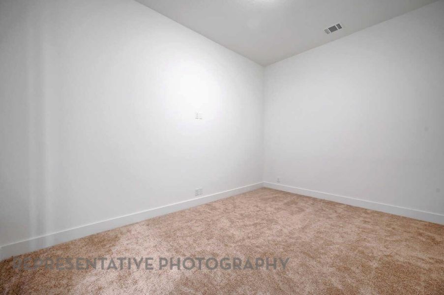 Spacious, unfurnished interior of a new home in Meridiana: 50ft. lots, Manvel (Image 18).