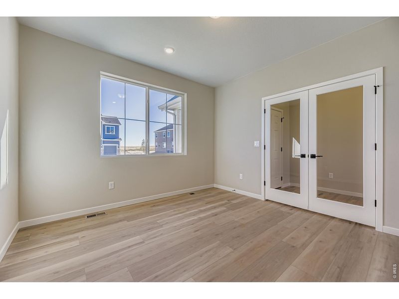 Spacious, unfurnished interior of a new home in Farmstead, Berthoud (Image 24).