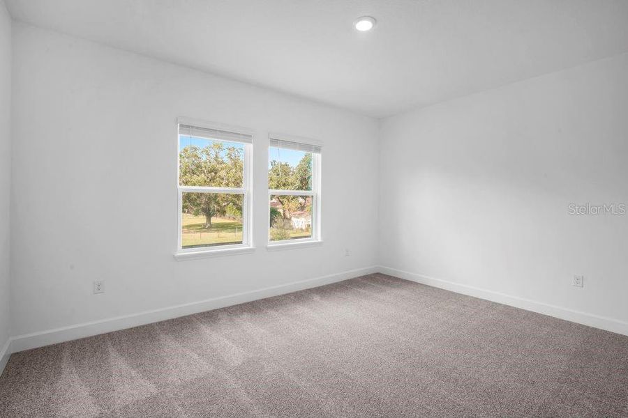 Spacious, unfurnished interior of a new home in Timber Ridge, Plant City (Image 24).