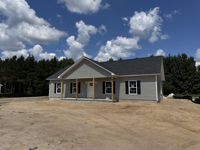 Front exterior of a new home in , St. George, SC, highlighting curb appeal (Image 15).
