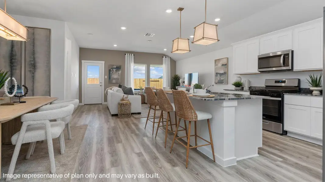 Furnished interior view inside a new home in Caldwell Crossing, Iowa Colony (Image 7).