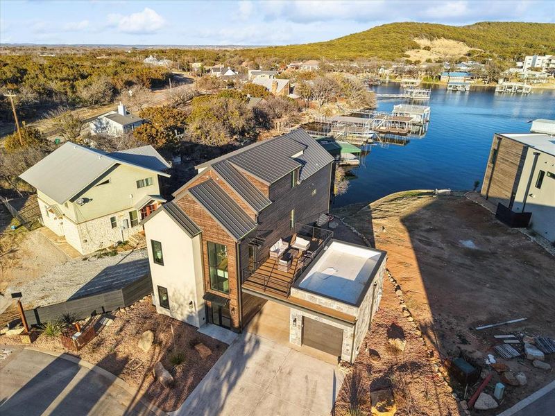 Front exterior of a new home in , Graford, TX, highlighting curb appeal (Image 20). Front exterior of a new home in , Graford, TX, highlighting curb appeal (Image 20).