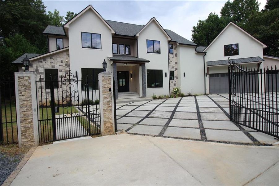 Front exterior of a new home in , Sandy Springs, GA, highlighting curb appeal (Image 1). Front exterior of a new home in , Sandy Springs, GA, highlighting curb appeal (Image 1).
