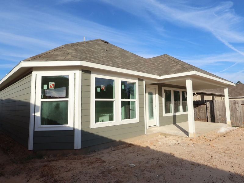 Exterior details and patio area of a home in Magnolia Ridge, Magnolia (Image 2). Exterior details and patio area of a home in Magnolia Ridge, Magnolia (Image 2).