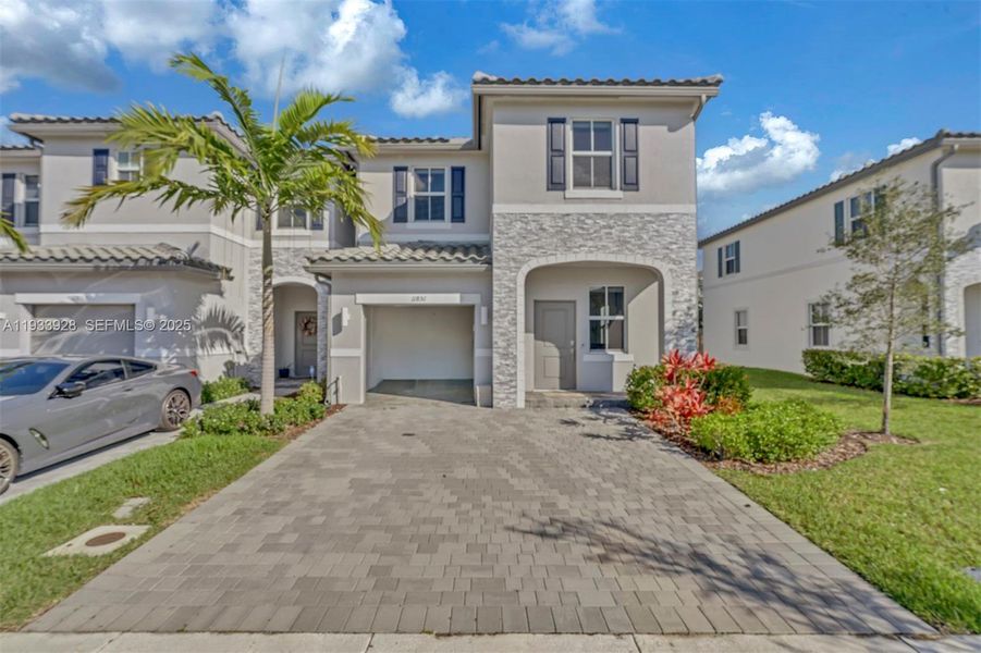 Front exterior of a new home in , Coral Springs, FL, highlighting curb appeal (Image 25).