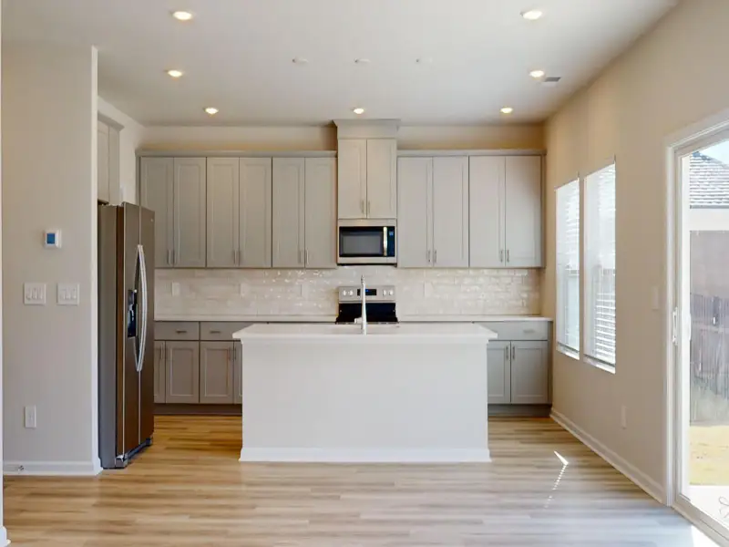 Furnished interior view inside a new home in Harper Landing, Stanley (Image 3).