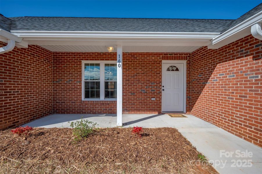 Front exterior of a new home in , Spindale, NC, highlighting curb appeal (Image 15).