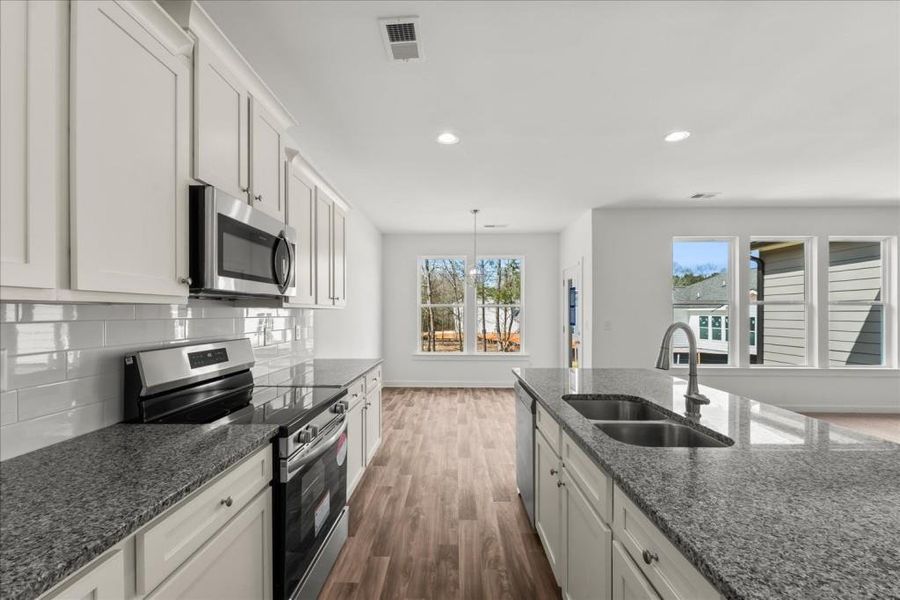 Furnished interior view inside a new home in , Statham (Image 9).