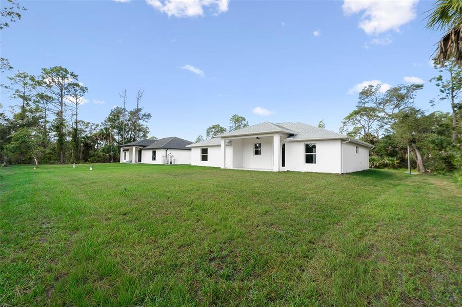 Exterior details and patio area of a home in , Port Charlotte (Image 18).