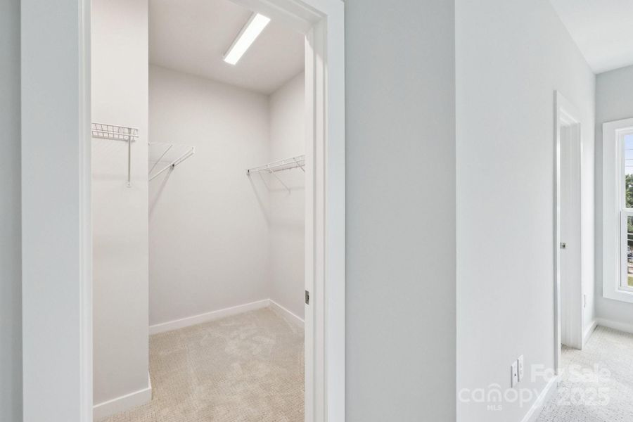 Spacious, unfurnished interior of a new home in Walk23, Huntersville (Image 20).