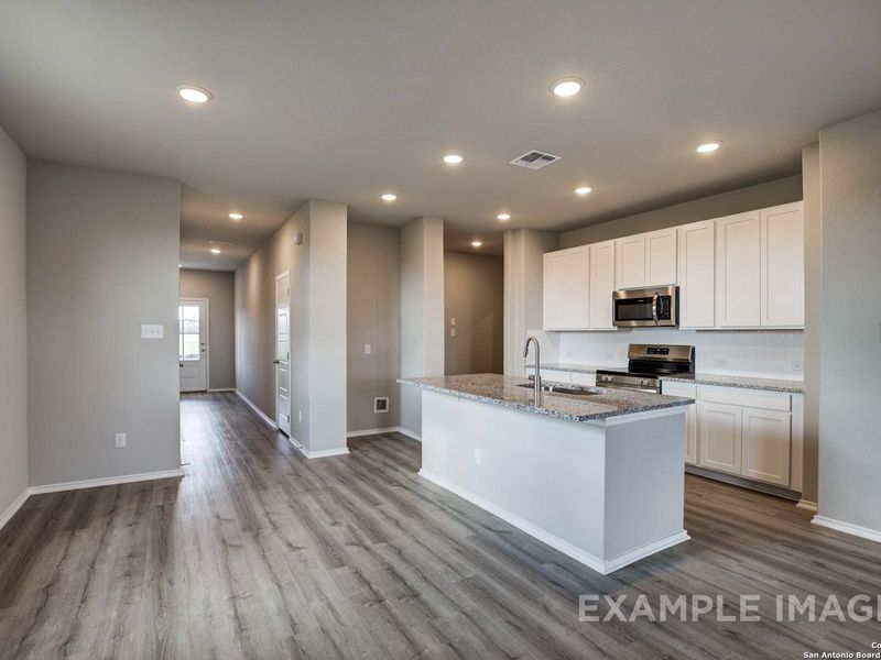 Furnished interior view inside a new home in Agave, San Antonio (Image 4).