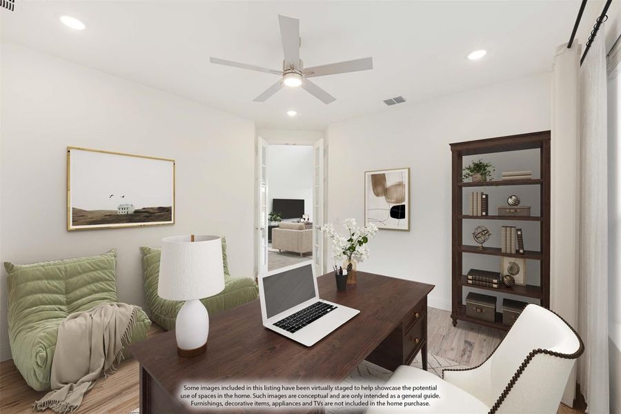 Home office with dark wood desk, ceiling fan, bookshelf, and seating area with hardwood floors Home office with dark wood desk, ceiling fan, bookshelf, and seating area with hardwood floors