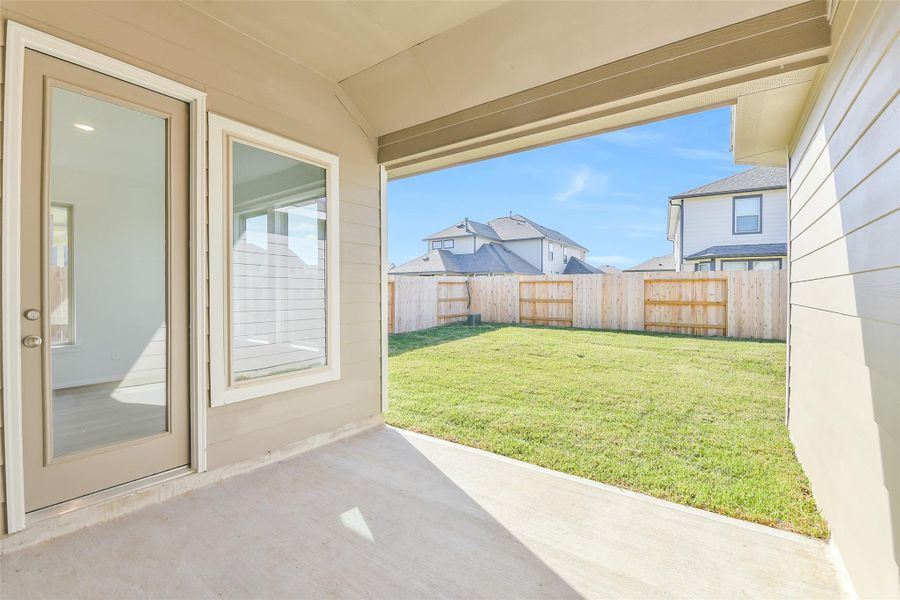 Exterior details and patio area of a home in Stone Creek Ranch, Hockley (Image 21).