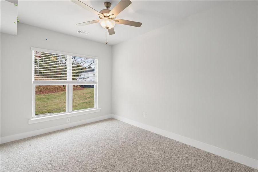 Spacious, unfurnished interior of a new home in Rose Creek, Cumming (Image 38).