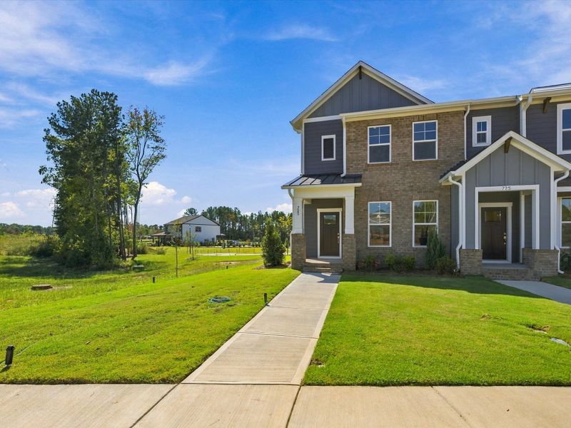 Front exterior of a new home in Hardy Pond Townhomes, Rock Hill, SC, highlighting curb appeal (Image 2). Front exterior of a new home in Hardy Pond Townhomes, Rock Hill, SC, highlighting curb appeal (Image 2).