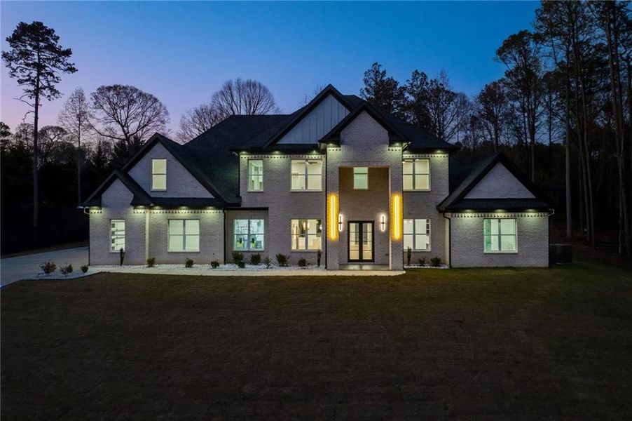 Front exterior of a new home in , Loganville, GA, highlighting curb appeal (Image 27).