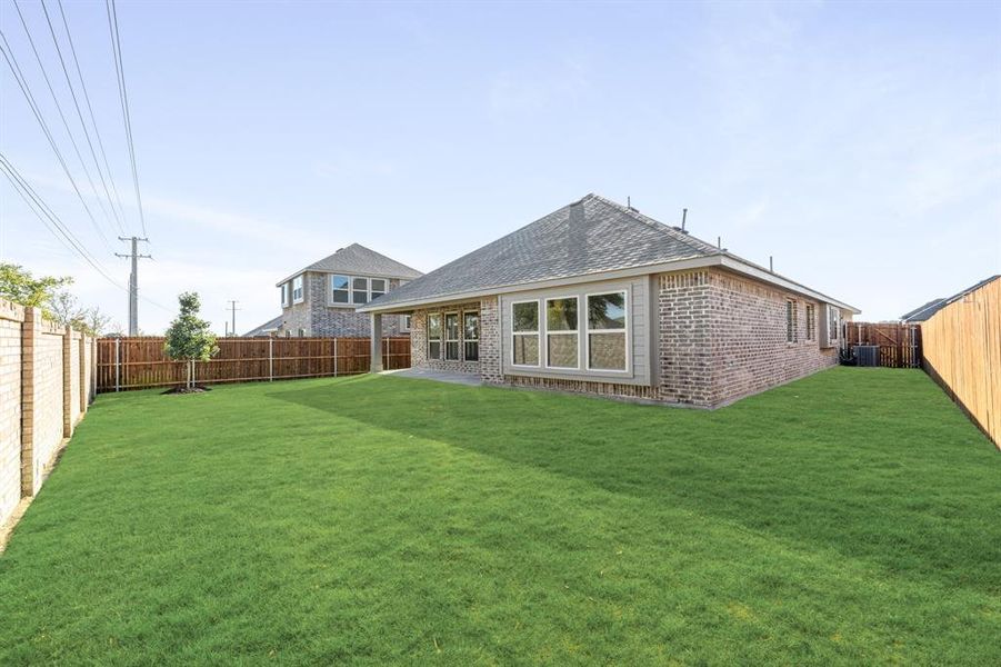 Exterior details and patio area of a home in Arcadia Trails Classic 50, Balch Springs (Image 3).