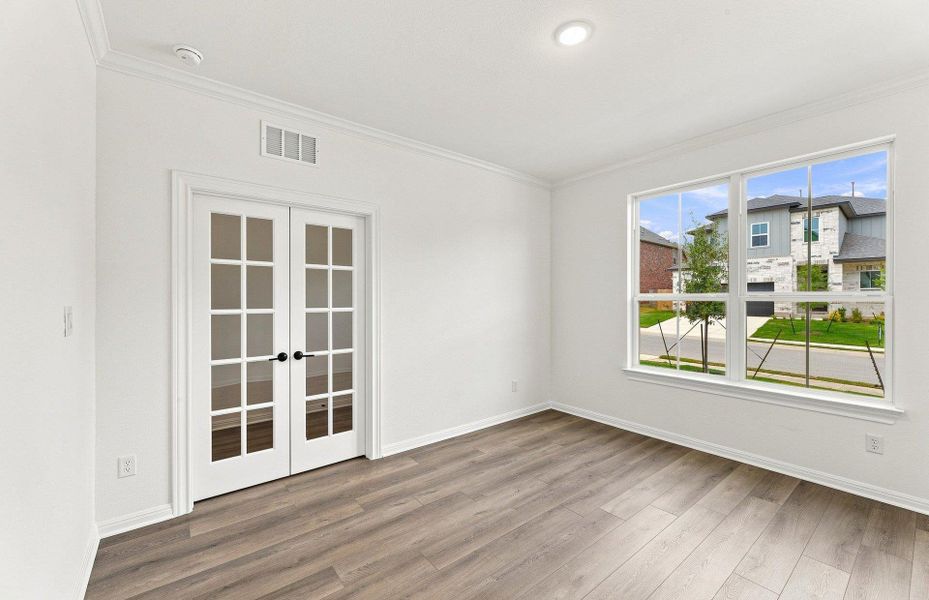 Spacious, unfurnished interior of a new home in Bluffview Reserve, Leander (Image 21).