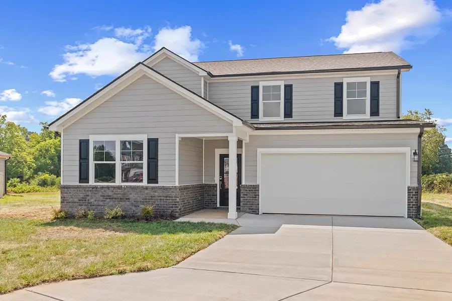 Front exterior of a new home in Barton Hills, Spring Hill, TN, highlighting curb appeal (Image 1). Front exterior of a new home in Barton Hills, Spring Hill, TN, highlighting curb appeal (Image 1).