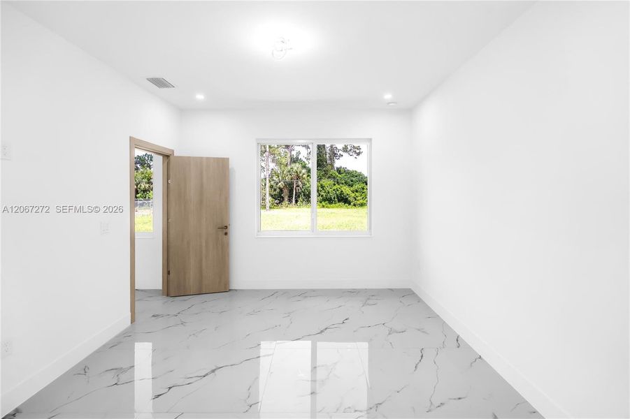 Spacious, unfurnished interior of a new home in , Lehigh Acres (Image 16). Spacious, unfurnished interior of a new home in , Lehigh Acres (Image 16).