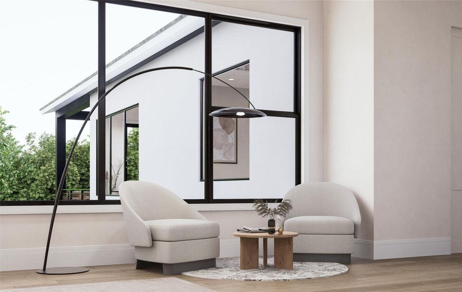 This corner of the primary suite showcases how the space may be arranged to support a relaxed seating area. Large picture windows and clean architectural lines create a calming backdrop, while the scale and layout allow for both quiet moments and custom design choices to suit individual lifestyle needs.