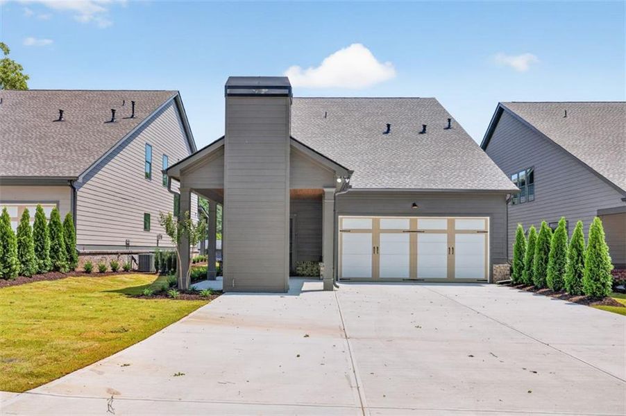 Front exterior of a new home in , Flowery Branch, GA, highlighting curb appeal (Image 35). Front exterior of a new home in , Flowery Branch, GA, highlighting curb appeal (Image 35).