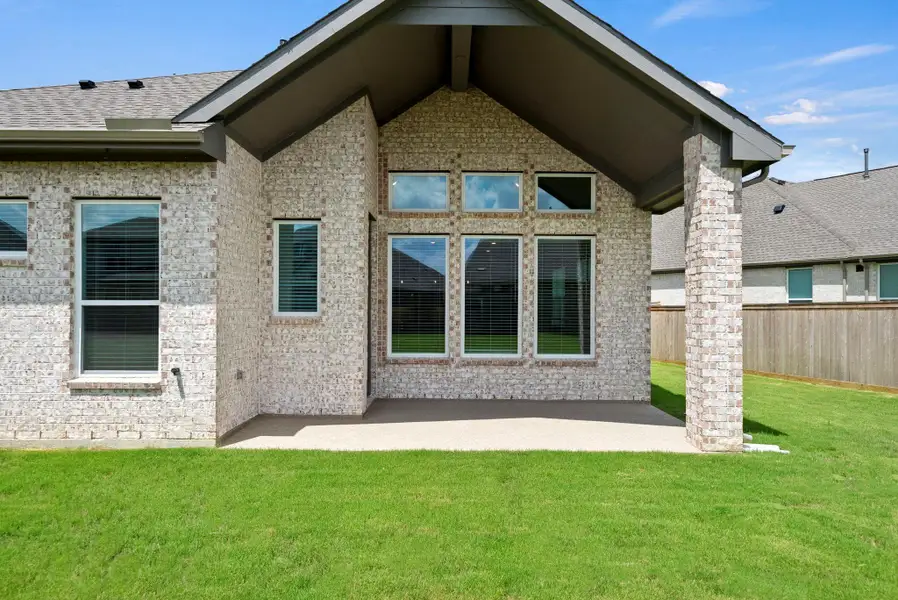 Exterior details and patio area of a home in Bridgeland 45's, Cypress (Image 3). Exterior details and patio area of a home in Bridgeland 45's, Cypress (Image 3).