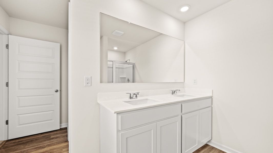 Representative furnished interior of a home built from the Flora by D.R. Horton in Poplar Preserve, Newnan (Image 9).