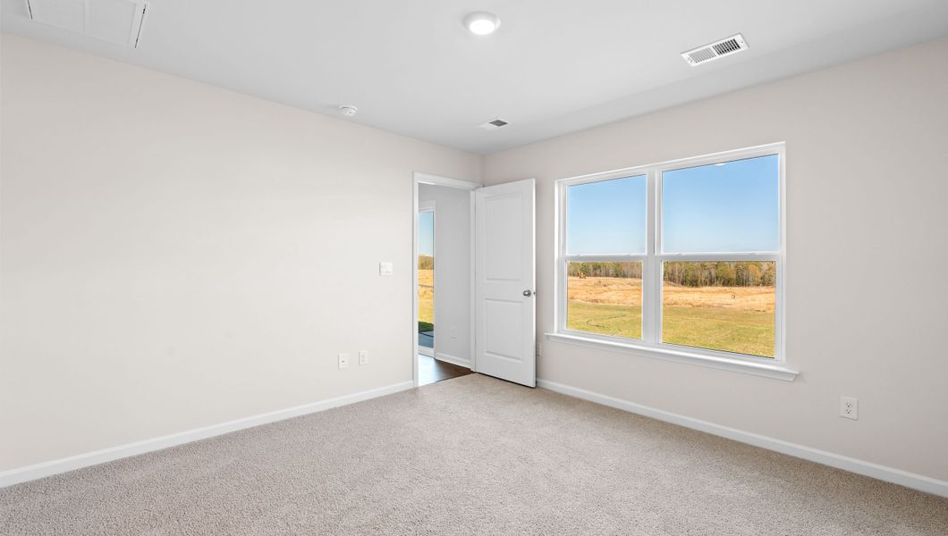 Representative unfurnished interior of a home built from the Macon by D.R. Horton in Lightwood Cottages, Moore (Image 19).