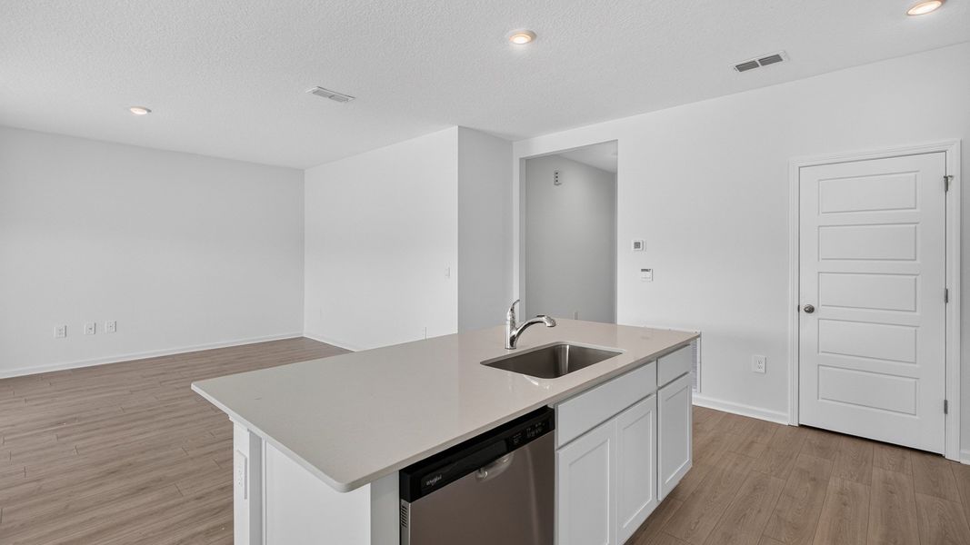 Representative furnished interior of a home built from the Aria+ by D.R. Horton in Diamond Springs, Jacksonville (Image 8).