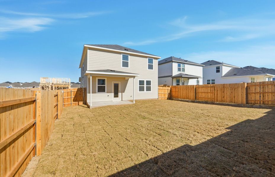 Exterior details and patio area of a home in Sunfield, Buda (Image 25).