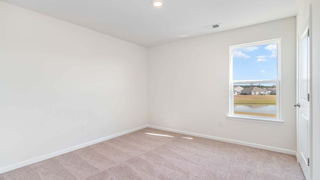 Spacious, unfurnished interior of a new home in Auberon Woods, Conway (Image 18).