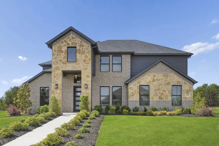 Front exterior of a new home in Ten Mile Creek, DeSoto, TX, highlighting curb appeal (Image 1). Front exterior of a new home in Ten Mile Creek, DeSoto, TX, highlighting curb appeal (Image 1).