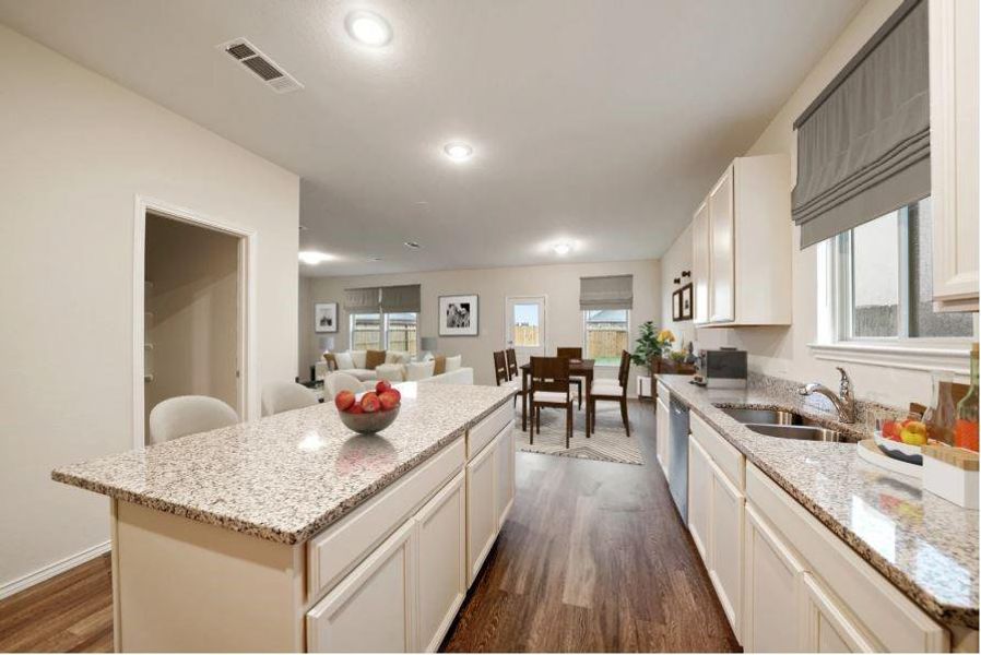 Photo of Pulte model home with same floor plan, not of actual home listed.