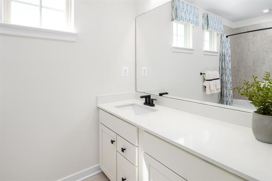 Representative furnished interior of a home built from the Griffin Hall by Ryan Homes in Newberry 55+, McDonough (Image 18).