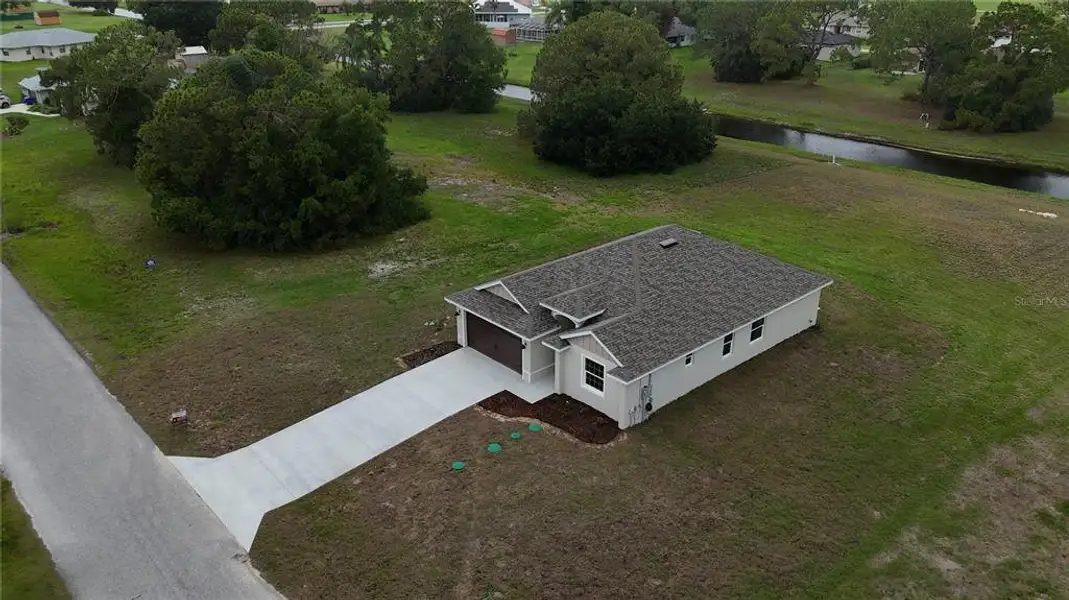 Front exterior of a new home in , Sebring, FL, highlighting curb appeal (Image 24).