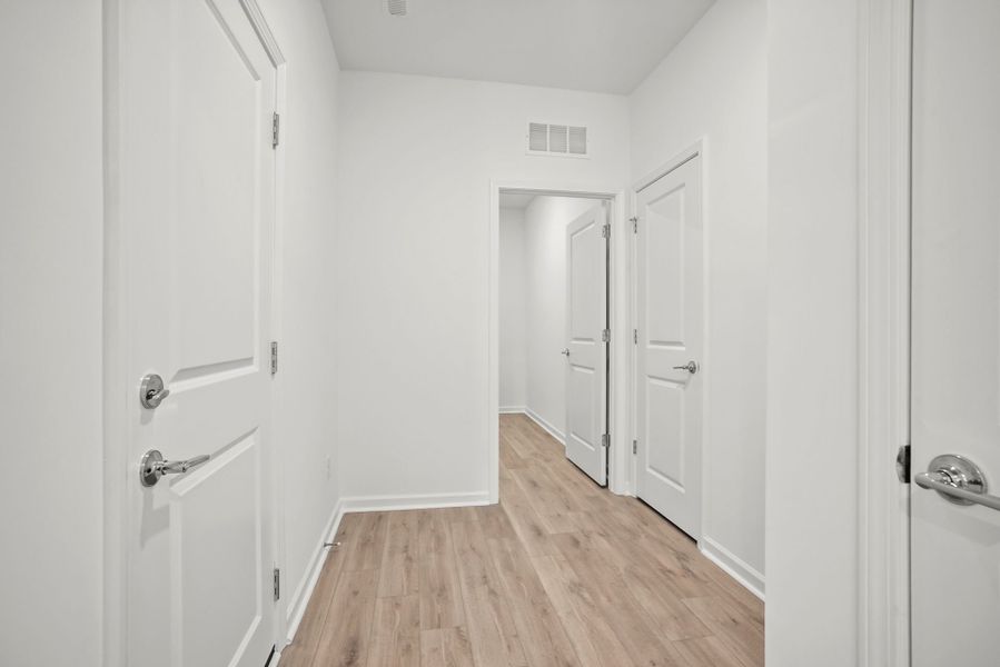Spacious, unfurnished interior of a new home in Michaux Gardens, Belmont (Image 90).