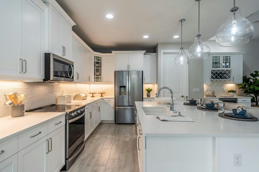 Representative furnished interior of a home built from the Allura by GHO Homes in High Pointe, Vero Beach (Image 10).