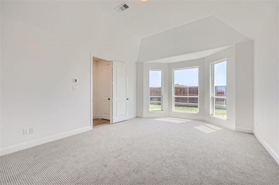 Unfurnished room featuring carpet floors