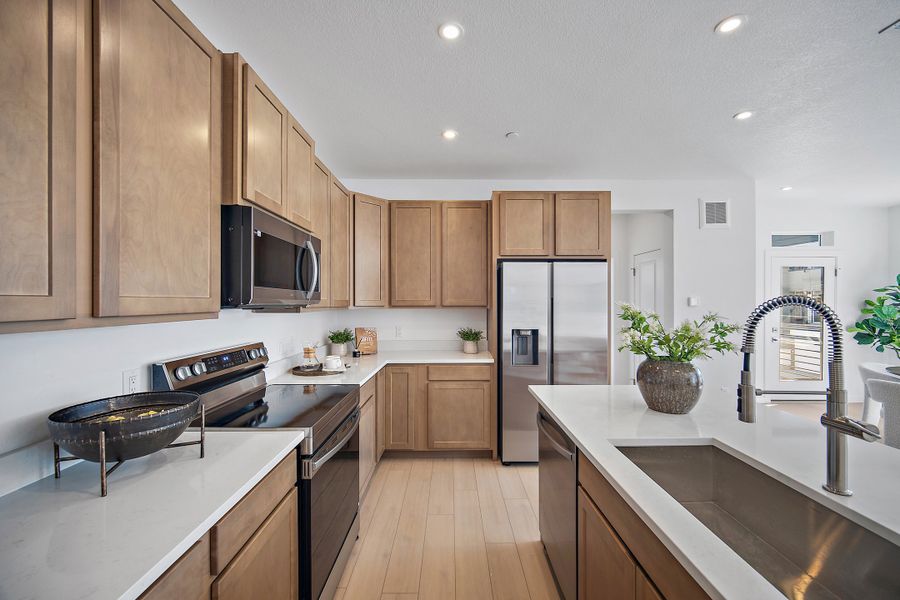 Furnished interior view inside a new home in Lyric at RidgeGate Condos, Lone Tree (Image 5).