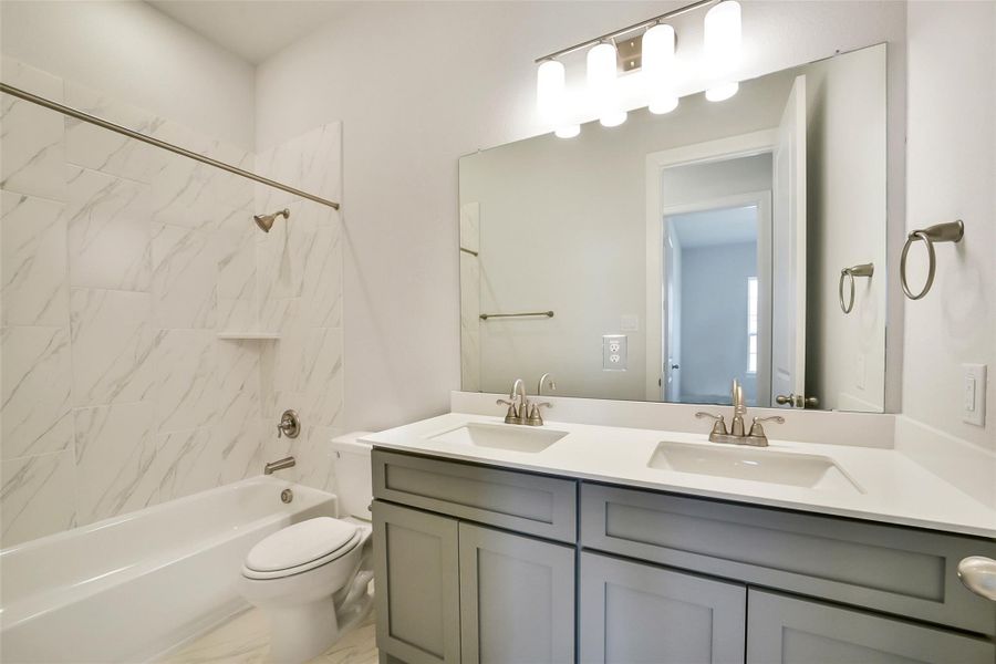 Furnished interior view inside a new home in Sienna 65', Missouri City (Image 30).