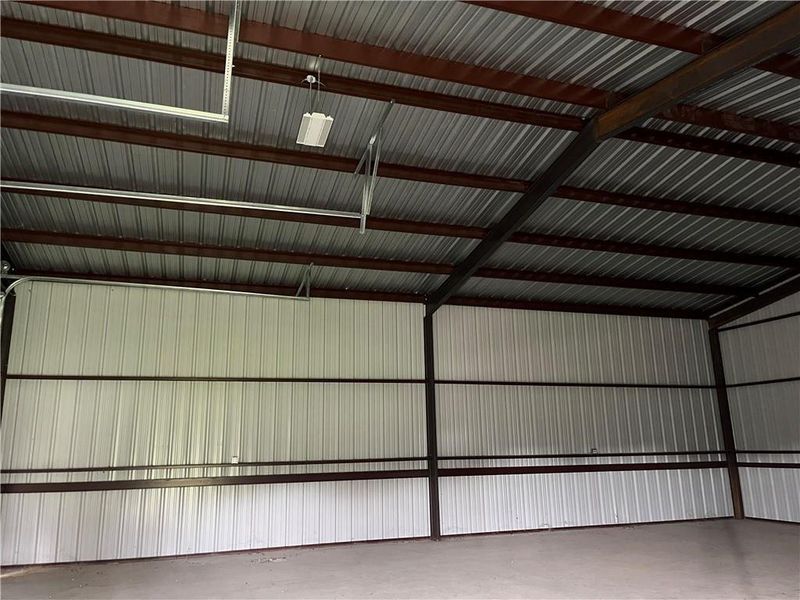 Garage featuring metal wall Garage featuring metal wall