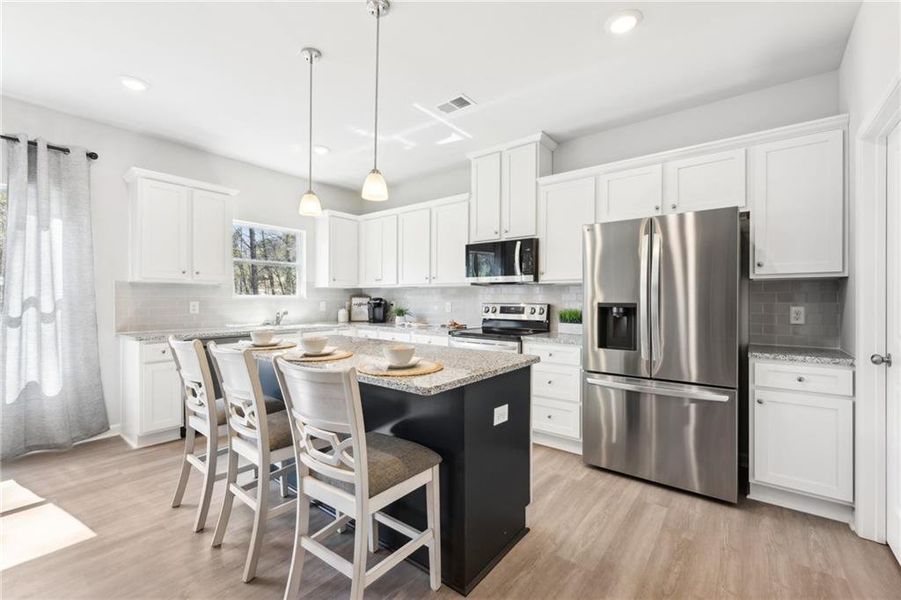 Furnished interior view inside a new home in The Hills at Cedar Creek, Winder (Image 17).