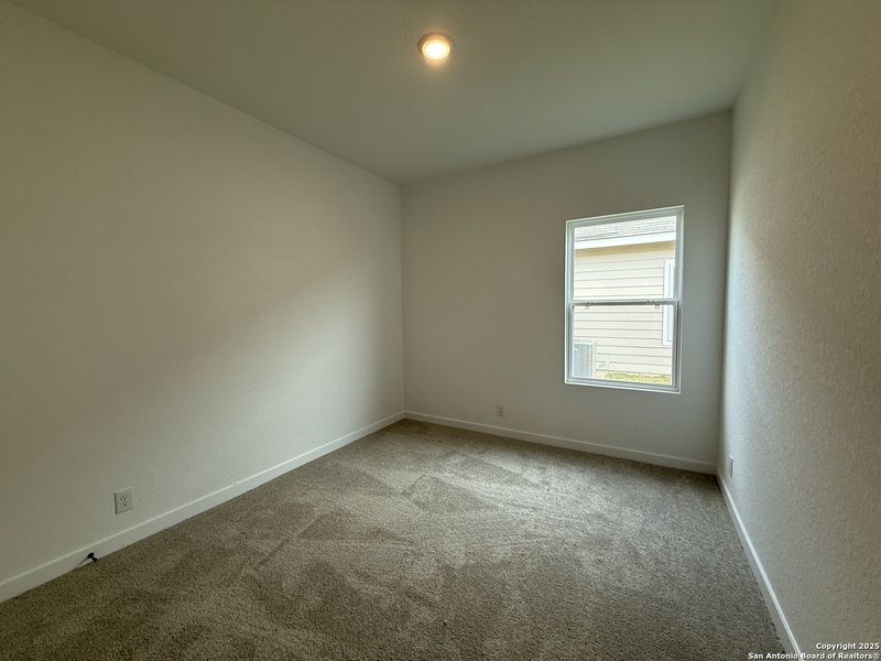 Spacious, unfurnished interior of a new home in Enclave at Hennersby Hollow 50's, San Antonio (Image 24).