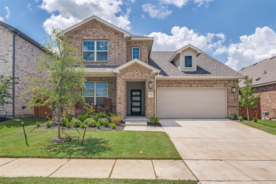 Front exterior of a new home in Heartland, Heartland, TX, highlighting curb appeal (Image 20). Front exterior of a new home in Heartland, Heartland, TX, highlighting curb appeal (Image 20).