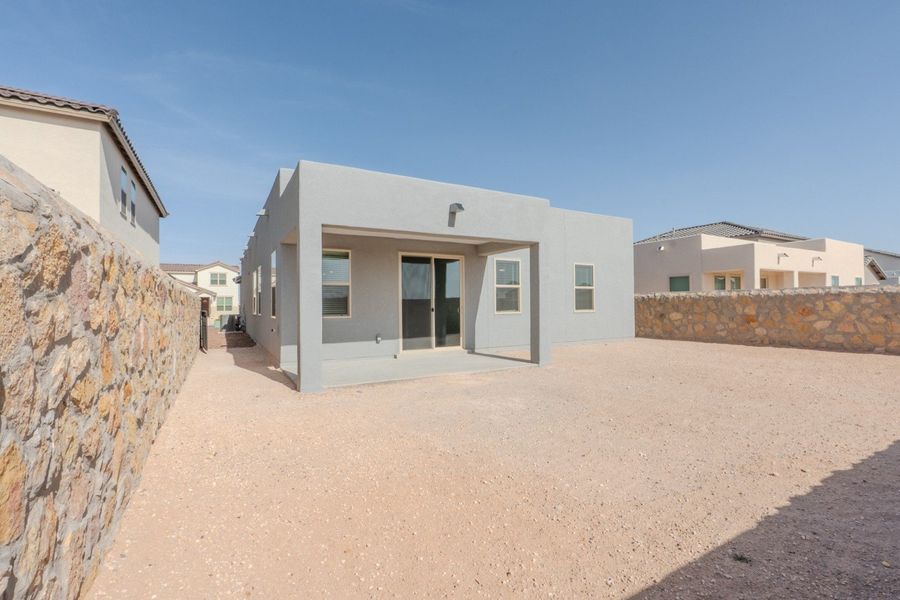Exterior details and patio area of a home in Paseo Del Este, El Paso (Image 4).