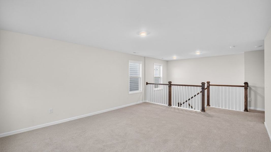 Representative unfurnished interior of a home built from the LAWSON by D.R. Horton in Horton Park, Apex (Image 22).