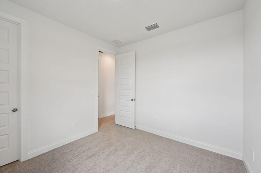 Spacious, unfurnished interior of a new home in Brystol at Wylder - Reserve Series, Port St. Lucie (Image 26).